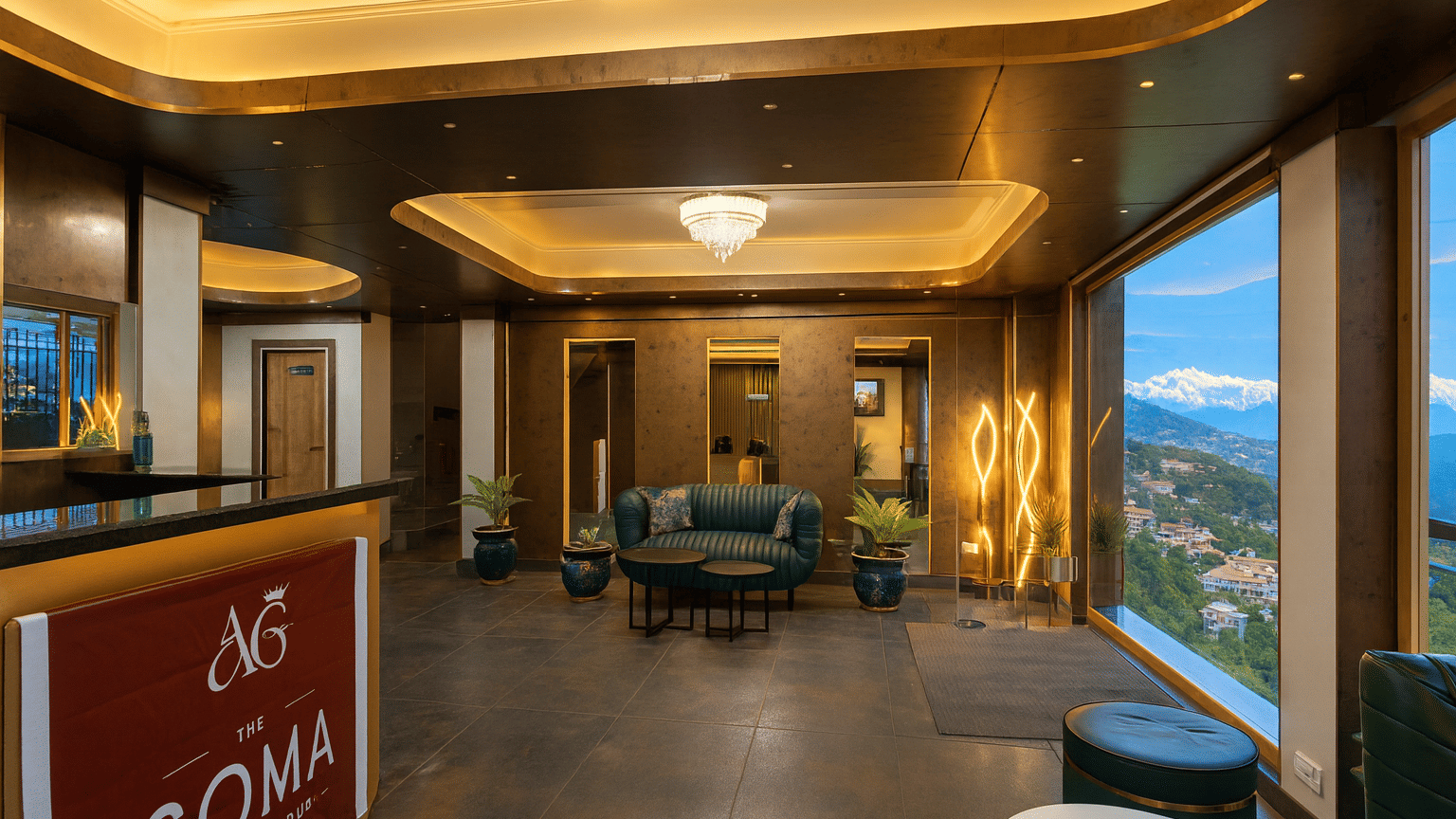 Luxury hotel lobby and reception area in Darjeeling with chandelier lighting, modern seating, elegant interiors, and large window showcasing panoramic mountain views
