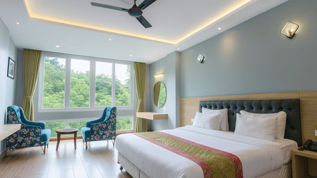 Executive hotel room with king-size bed, modern interiors, large windows opening to a lush forest view, and bright natural morning lighting for a premium 3-star experience