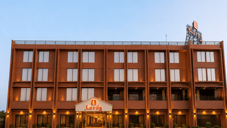 Exterior view of Lords Inn Sanand Gujarat showcasing its modern façade and welcoming entrance.