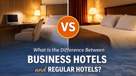Hotel room interior with bed and lamps illustrating the difference between business hotels and regular hotels.