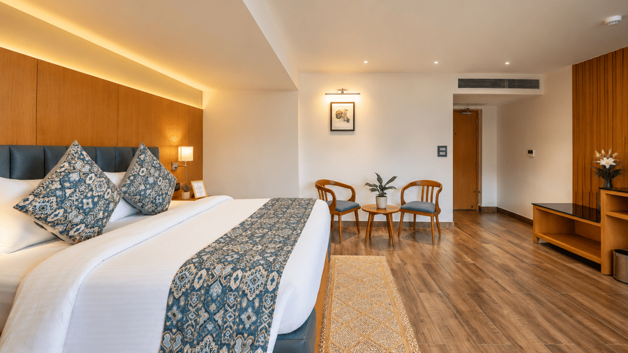A bright and spacious bedroom with plush bedding at BluSalzz Collection - Casa Onze, Arpora.