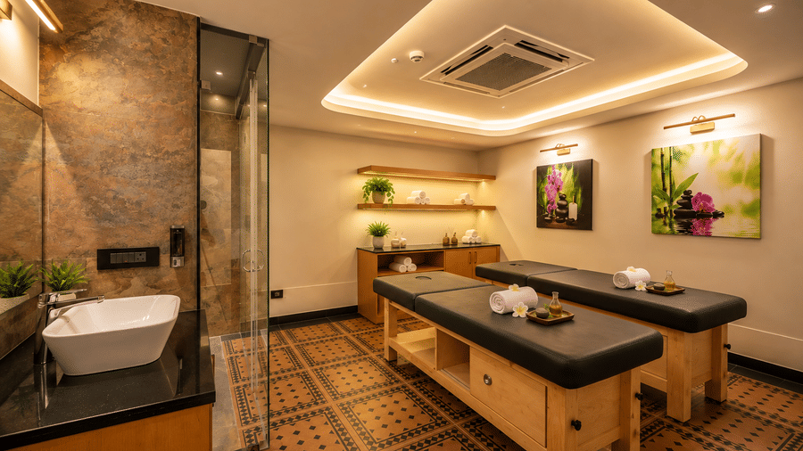 A cosy wellness spa treatment room with massage tables at BluSalzz Collection - Casa Onze, Arpora.