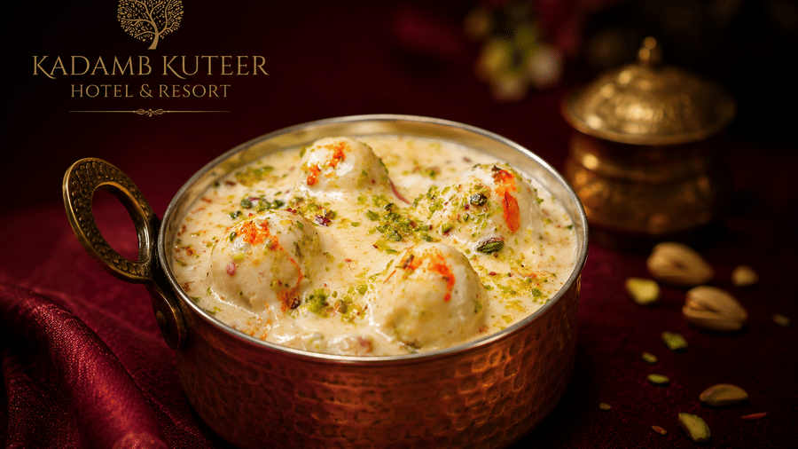 Malai kofta served in a copper pot on a branded placemat at Kadamb Kuteer, Vrindavan.