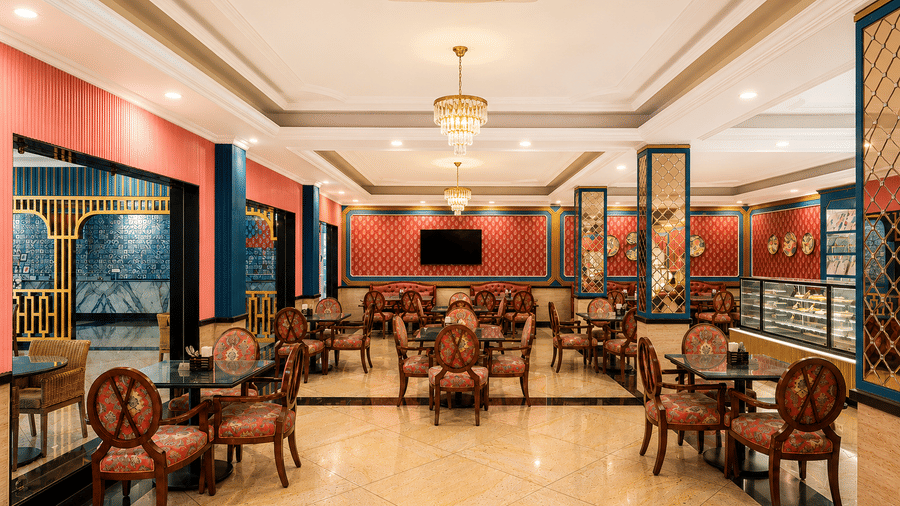Supersnax café seating area at Mayfair Oasis Resort, Jharsuguda
