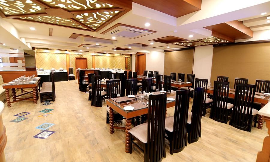 The seating arrangement at the Restaurant 3 - Udman Hotel Haridwar