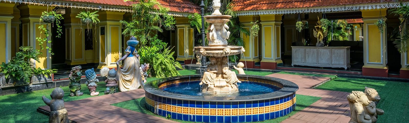 a small pond and a fountain - Mayfair Lagoon, Bhubaneswar