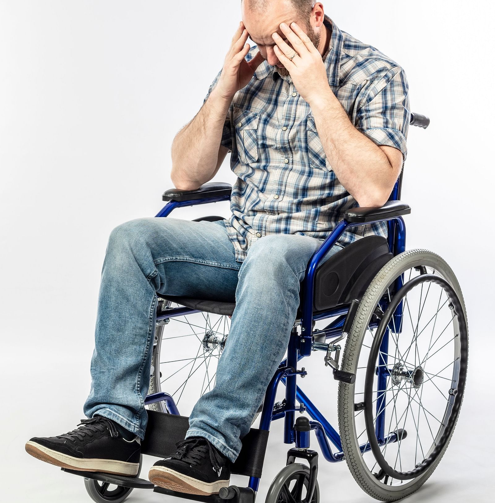A man in a wheelchair likely facing mobility challenges - Shreyas Retreat