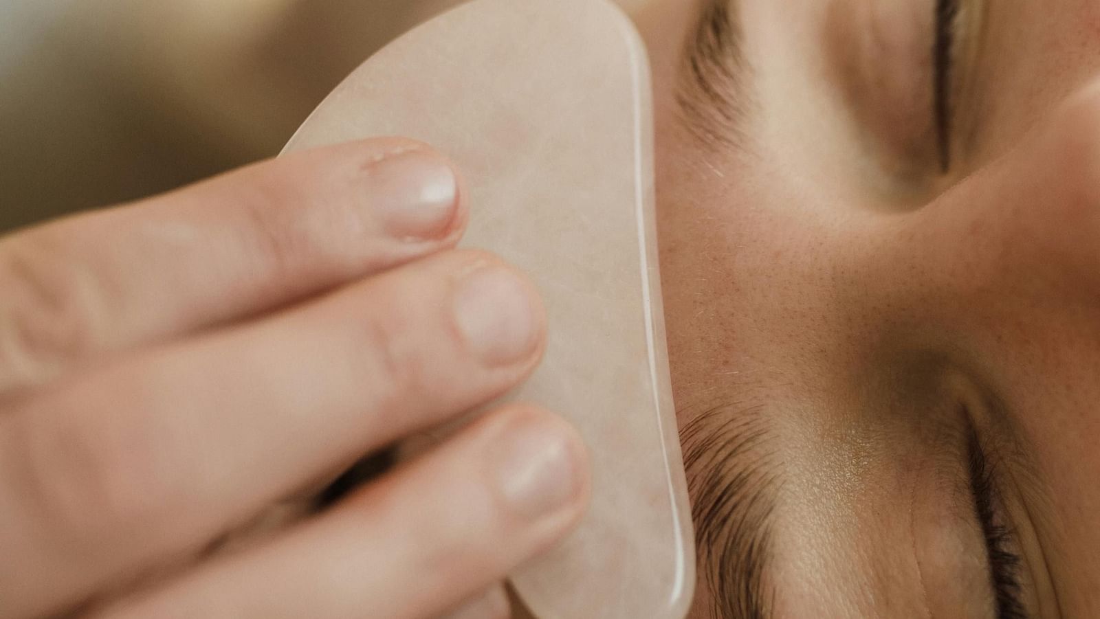 Shot of a women receiving head massage.