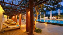 lounge chairs beside the Swimming Pool at Karma Lakelands.