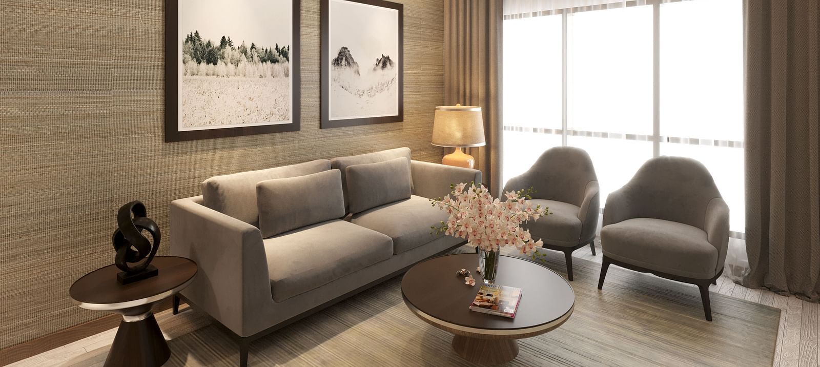 One Bedroom Suite in Kinshasa at Kertel Suites with a grey sofa set with two paintings hung over it