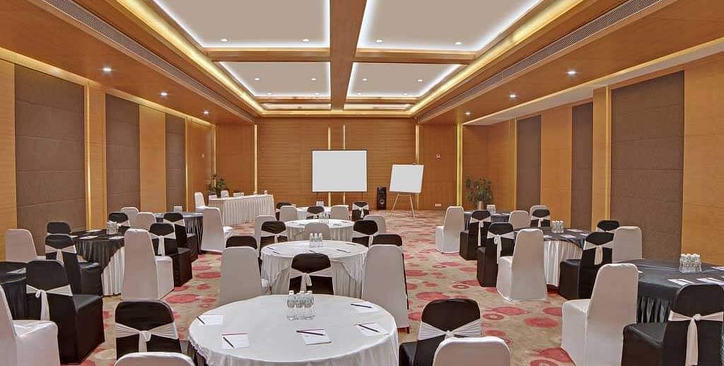 Conference Hall with chairs and tables at Summit by the Ganges Rishikesh