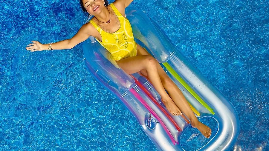 woman chilling in the pool