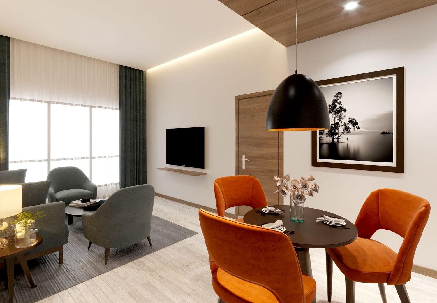 the living room of a Two Bedroom Suite in Kinshasa at Kertel Suites with a dining area and a wall mounted television