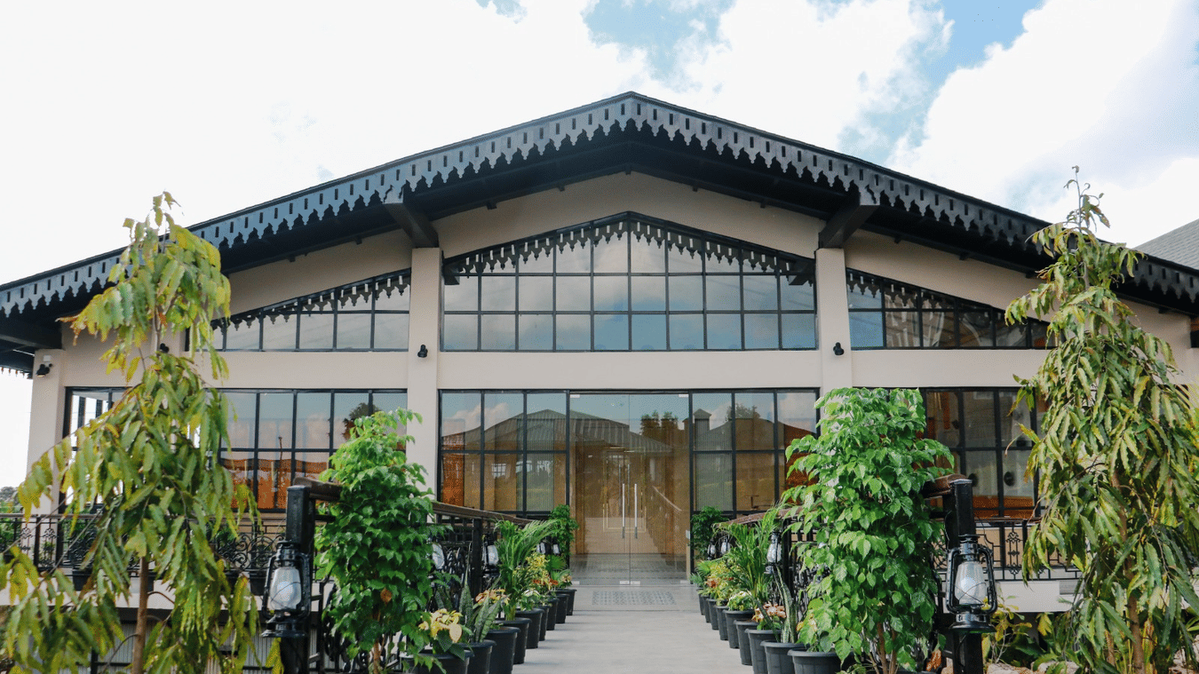View of Mausmai Ballroom with a grid-structured glass façade, flooding the space with natural light and offering stunning outdoor views