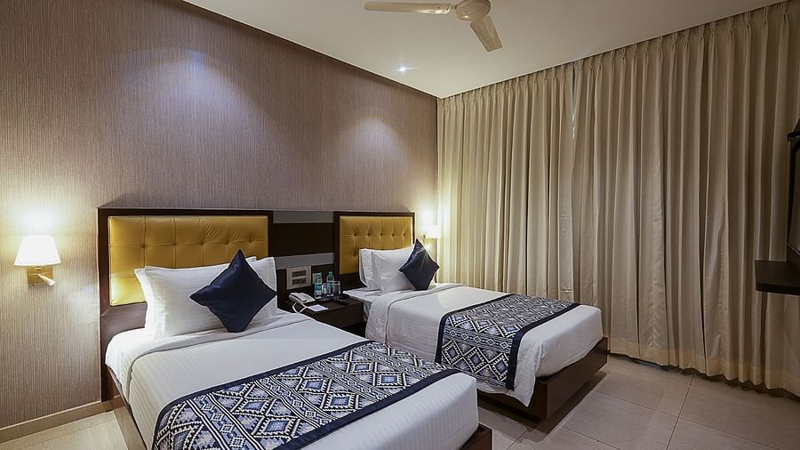 A image of twin beds in our executive room - Grand Continent, Malleshwaram