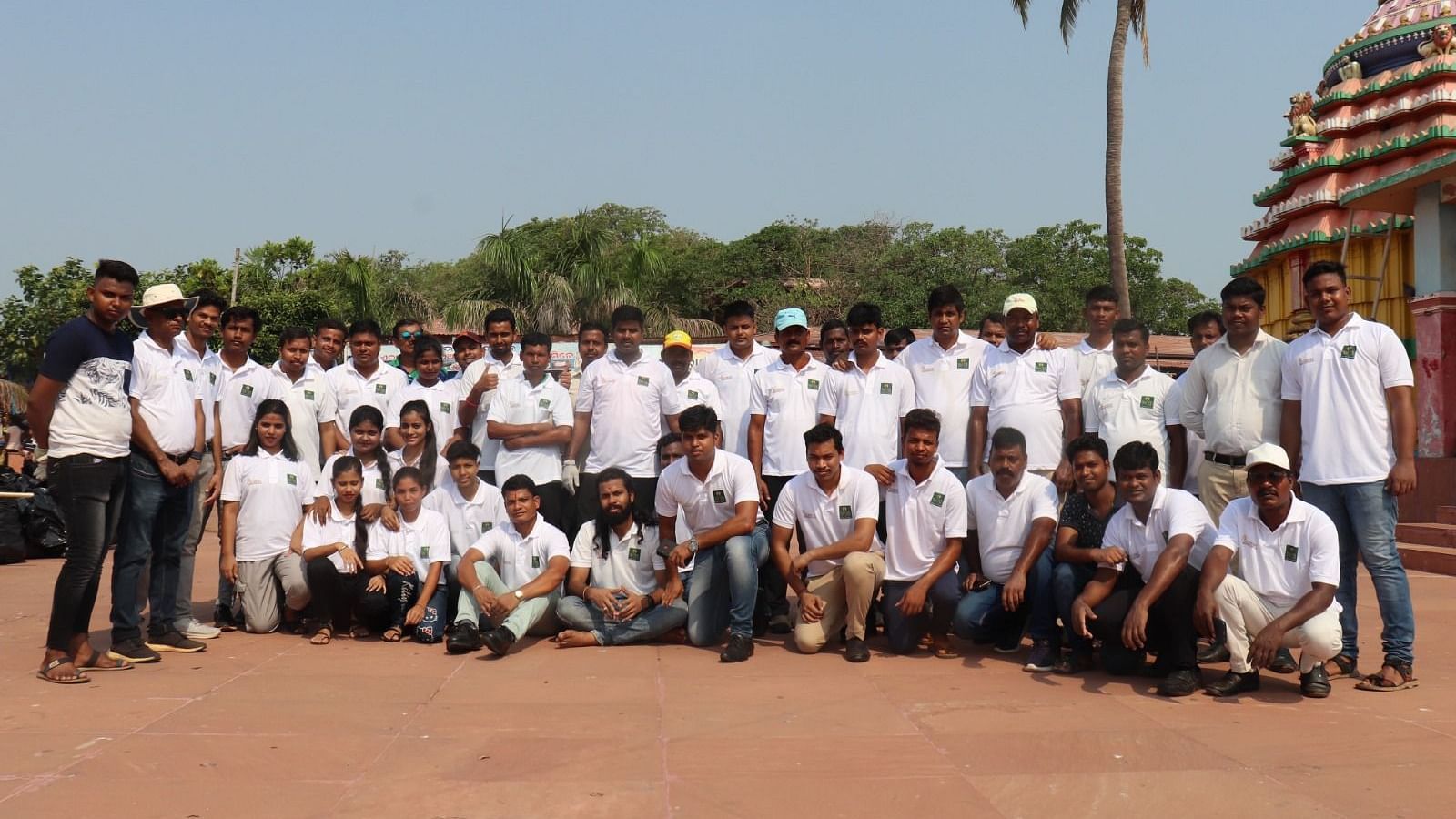 People gathered for a river clean up program organised by Swosti Resorts
