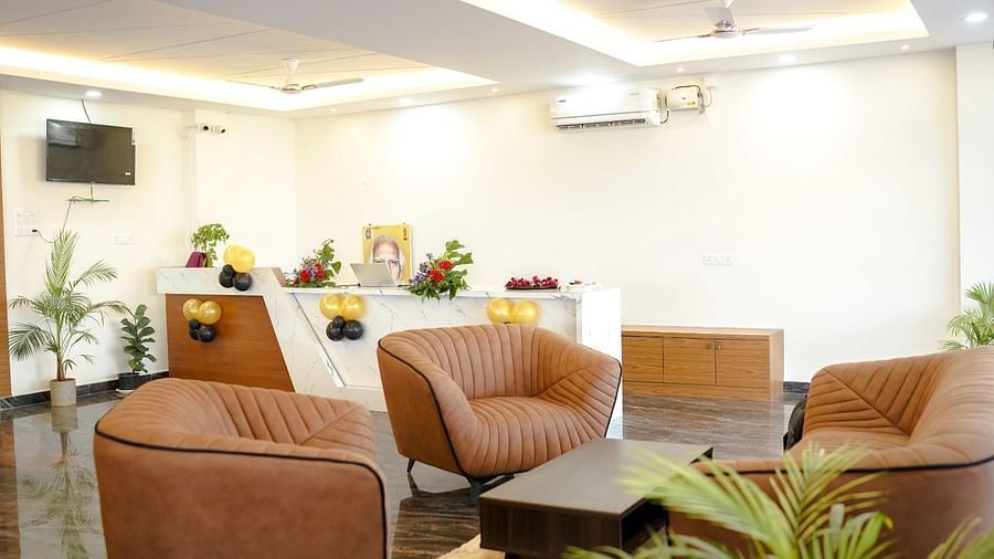 Well-lit lobby area of ANS M Square Hotel & Resort, Kalaburagi