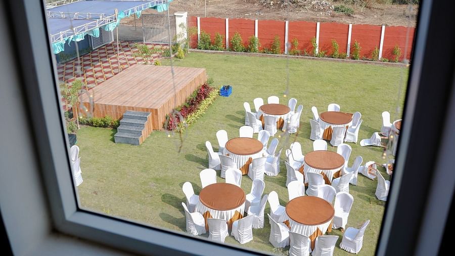 Seating  and stage arrangement in the garden area of ANS M Square Hotel & Resort, Kalaburagi