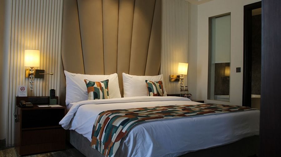 A stylish bedroom featuring a fancy headboard on the bed at BluSalzz Residence, Amritsar.