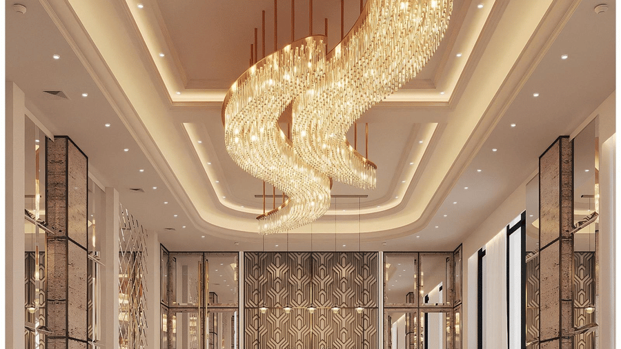 A close-up shot of the chandelier hanging in the lobby area of Essentia Luxury Hotel and Convention, Nagpur, from the false ceiling.