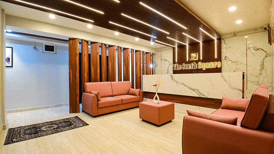 lobby area with comfortable seating of  South Square Hotel, Bengaluru