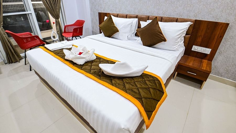 view of the king size beds at Premium Balcony Room of South Square Hotel, Bengaluru