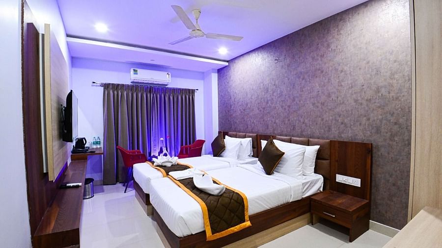 view of the king size beds at Premium Balcony Room of South Square Hotel, Bengaluru