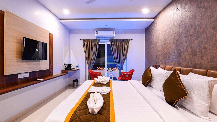 view of the king size beds at Premium Balcony Room of South Square Hotel, Bengaluru