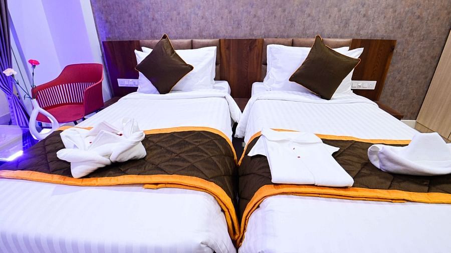 view of the twin beds of Twin Deluxe Room at South Square Hotel, Bengaluru