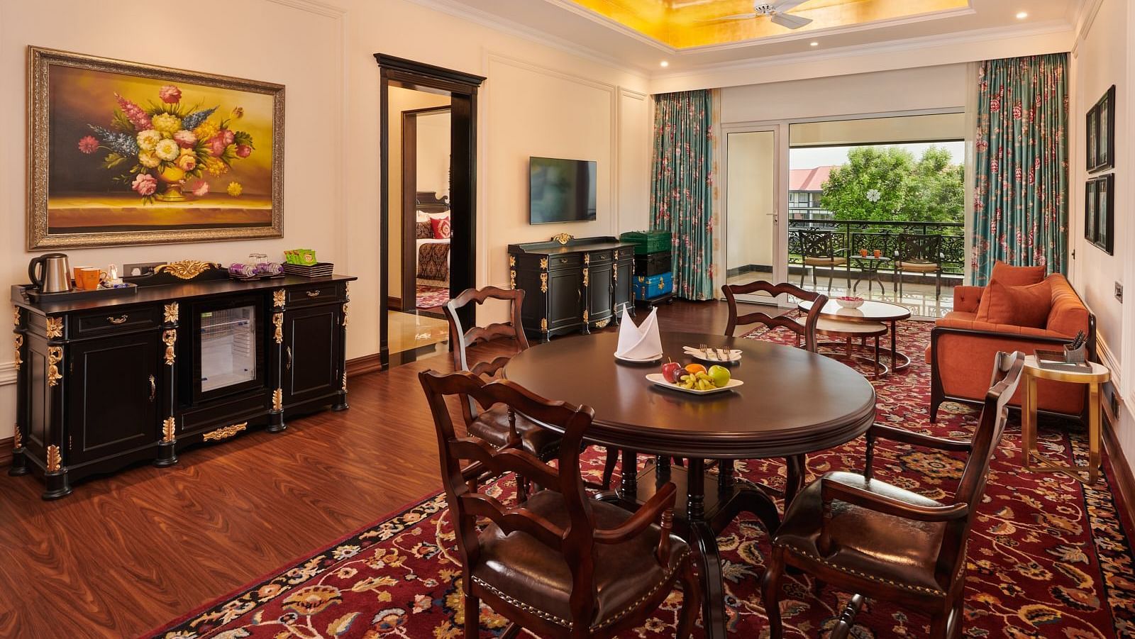 Elegant dining room with wooden furniture and natural lighting at MAYFAIR Tea Resort, Siliguri