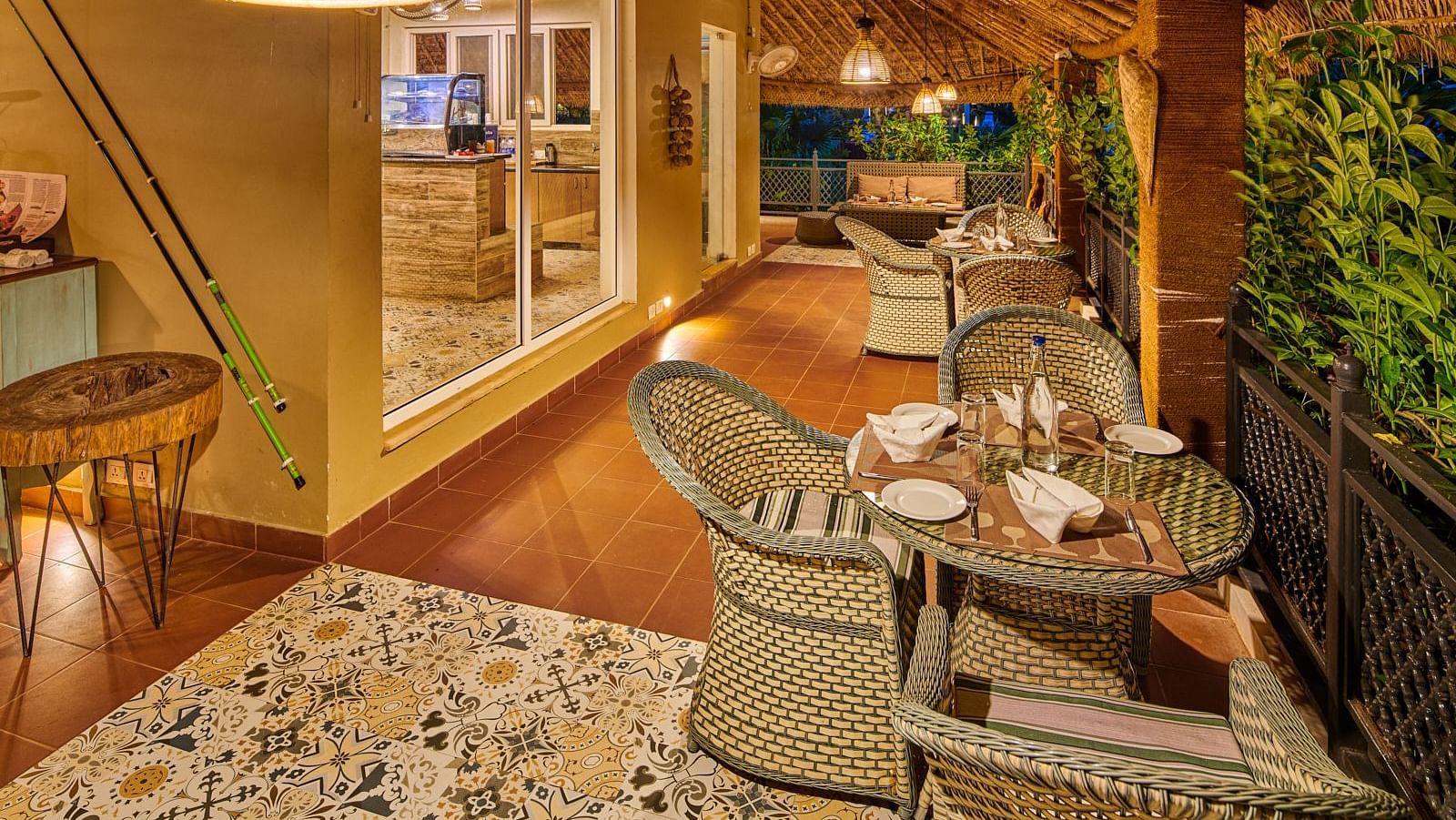 Open air dining arrangment at Bean Hive restaurant at Swosti Chilika Resort