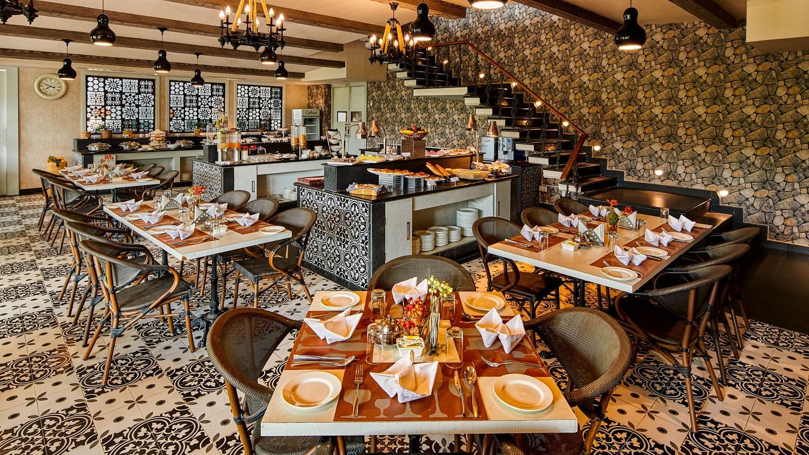 Seating arrangement at Orana Restaurant at Swosti Chilika Resort