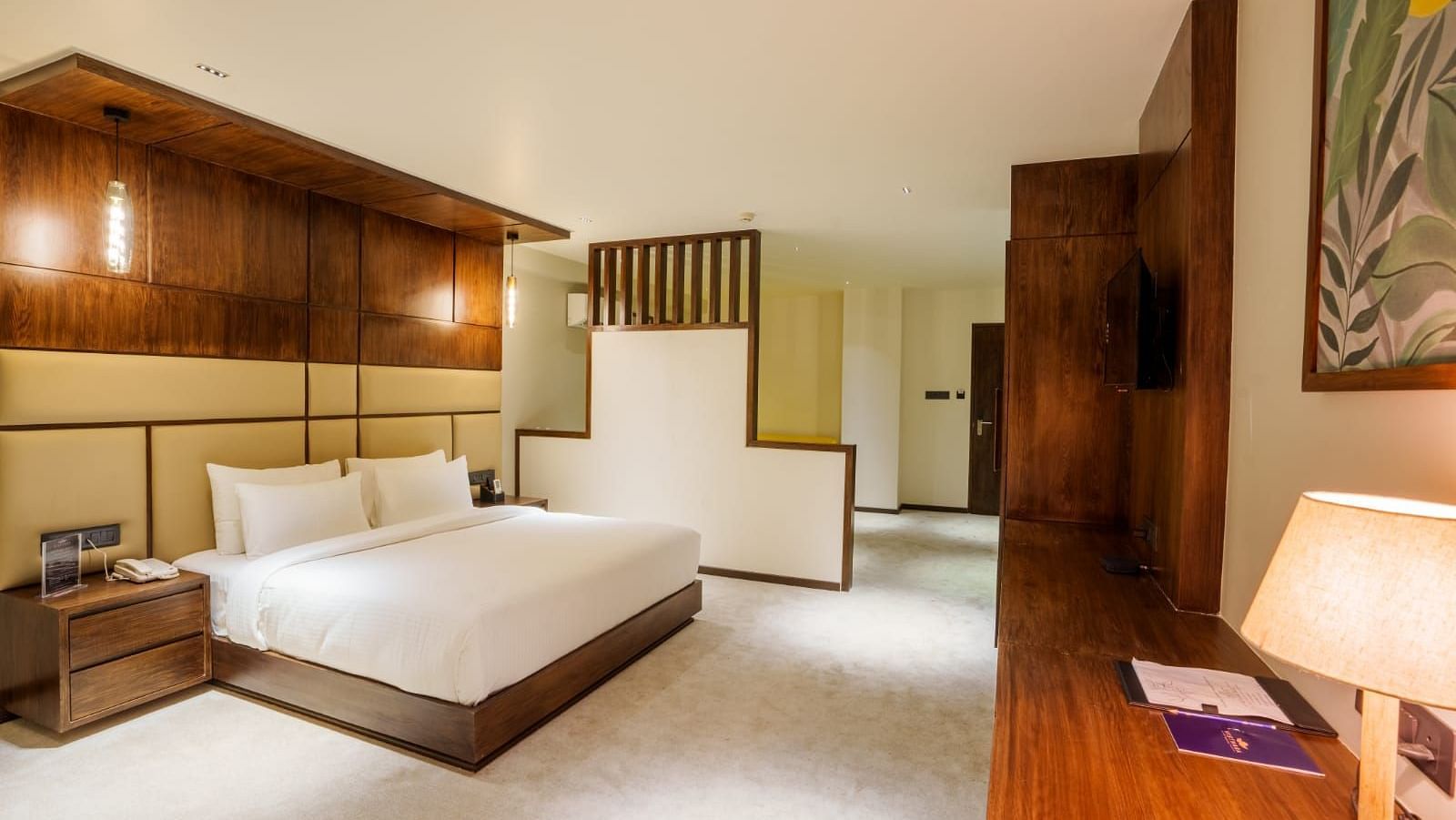 Image of a double bed at the Suite at Visthara - Urban Boutique Hotel