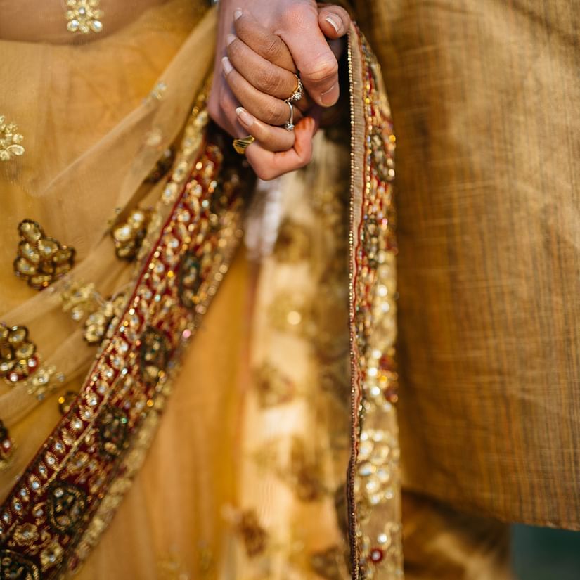 A couple holding hands