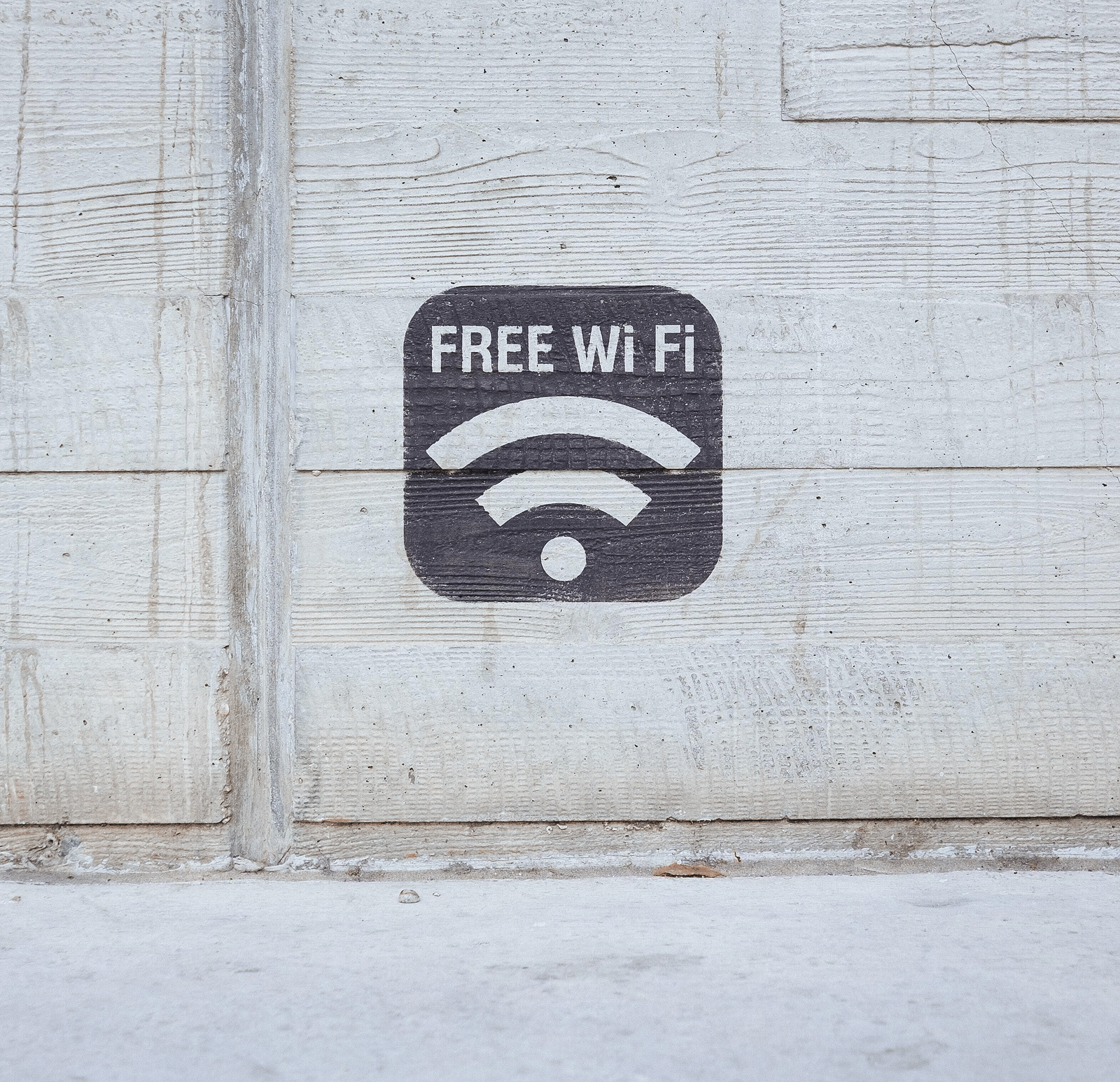 An icon with a text free wifi and a logo of wifi