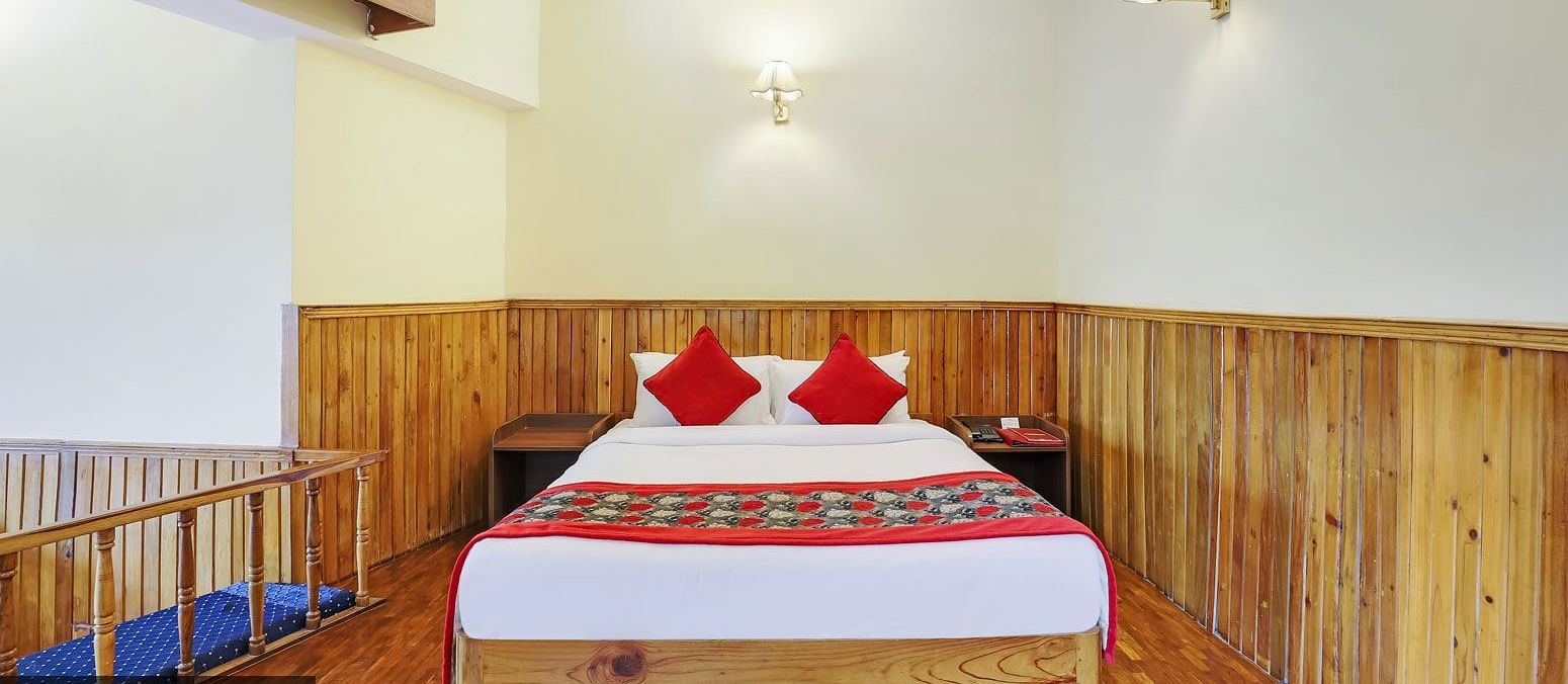 A front view of a bed in a room | Summit Newa Regency & Spa, Pelling