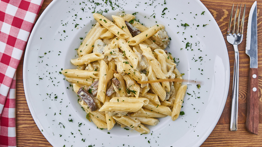 Canva - Flat Lay Photography of Pasta Served in White Plate 1