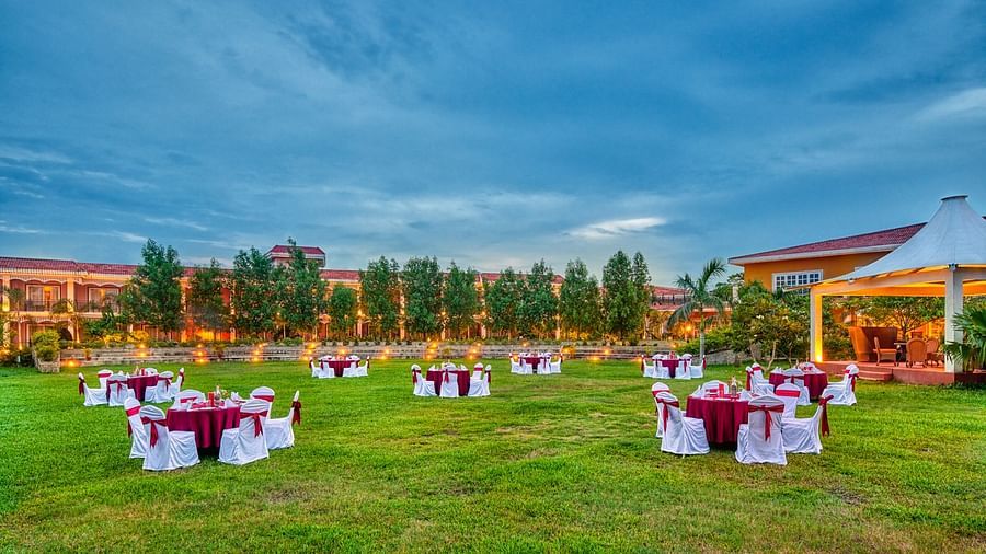 Seating arrangement in the lawn at Swosti Chilika Resort