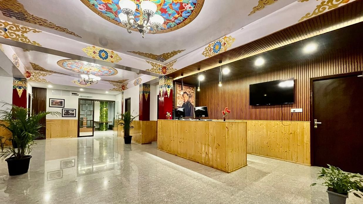 A wide view of a well-lit reception area at our hotel near MG Marg | Voyage The Royal Retreat, Gangtok