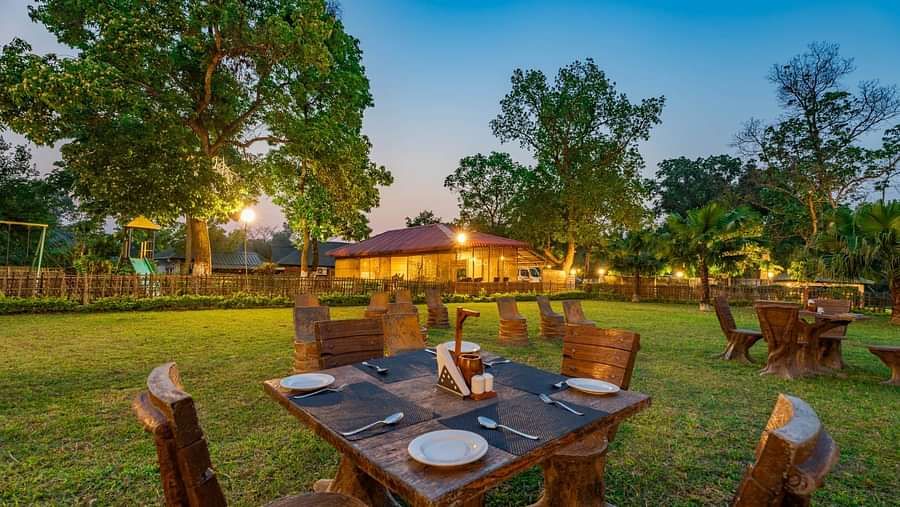 Outdoor dinning at Summit Green Lake Tea Resort & Spa, Kaziranga
