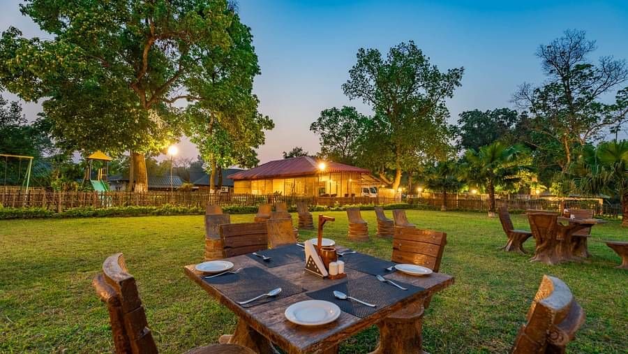 Outdoor dinning at Summit Green Lake Tea Resort & Spa, Kaziranga