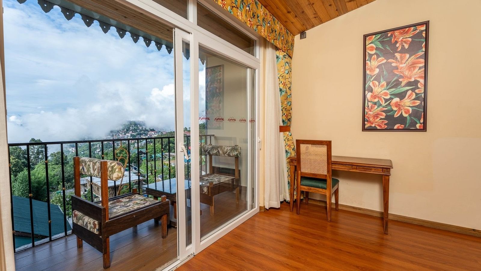 View of the mountains from a balcony of a room at Summit Barsana Resort & Spa, Kalimpong
