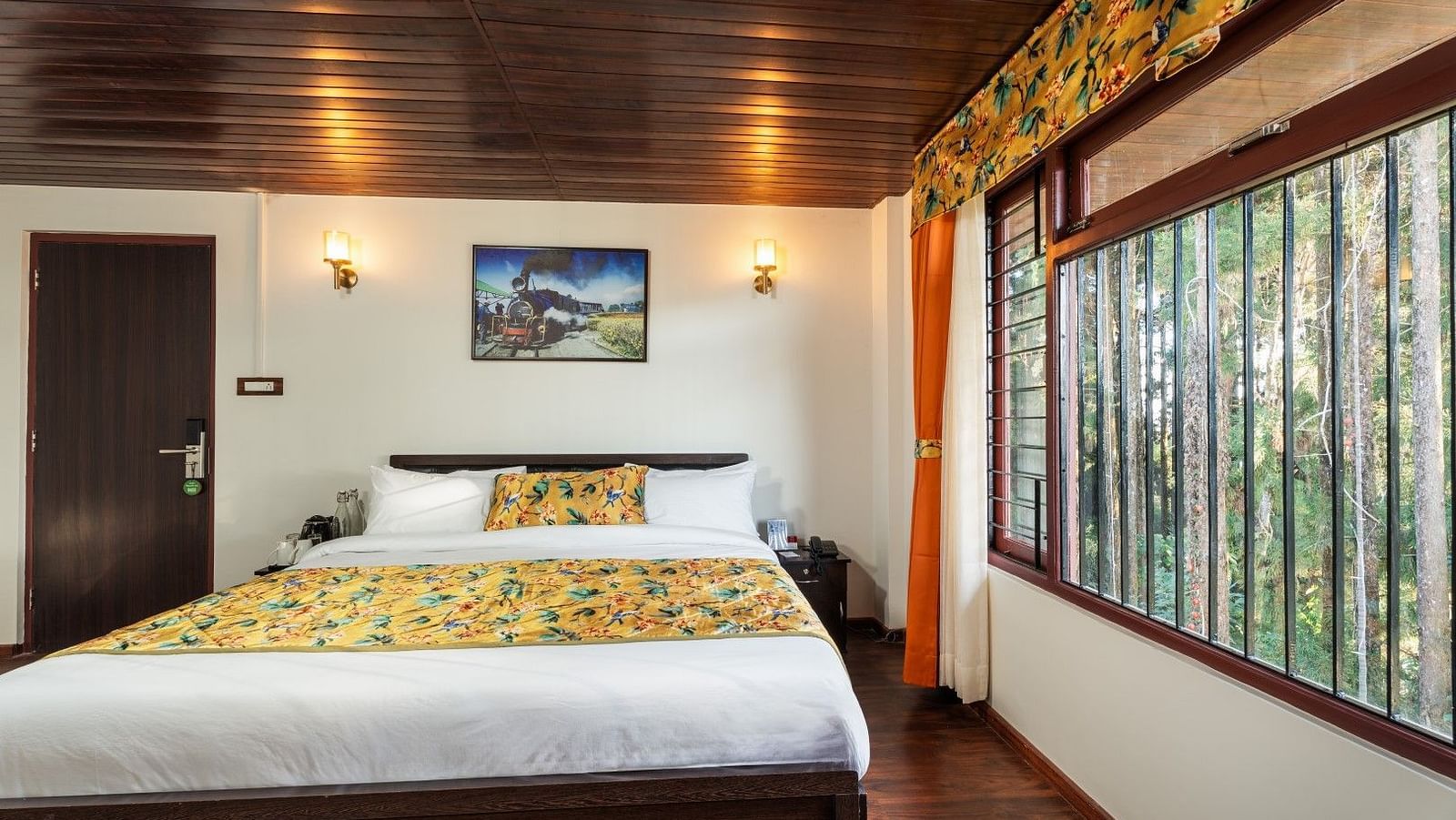 Image of a room with bed and and wooden ceiling at Summit Sherpa Mountain Hotel & Spa, Kalimpong
