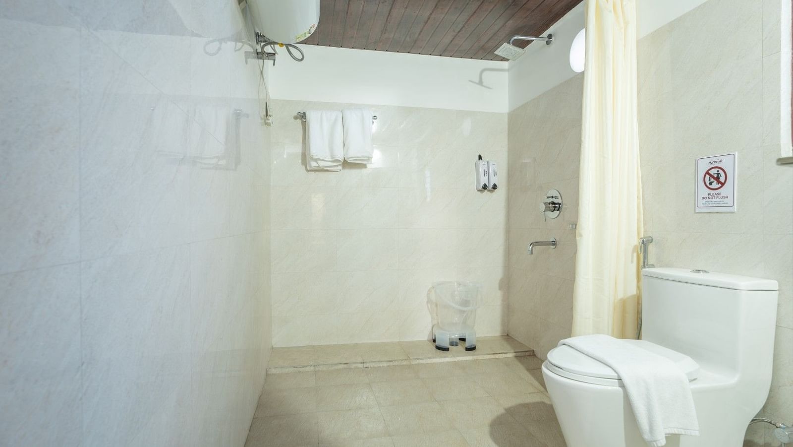 Image of a washroom with modern amenities at Summit Sherpa Mountain Hotel & Spa, Kalimpong