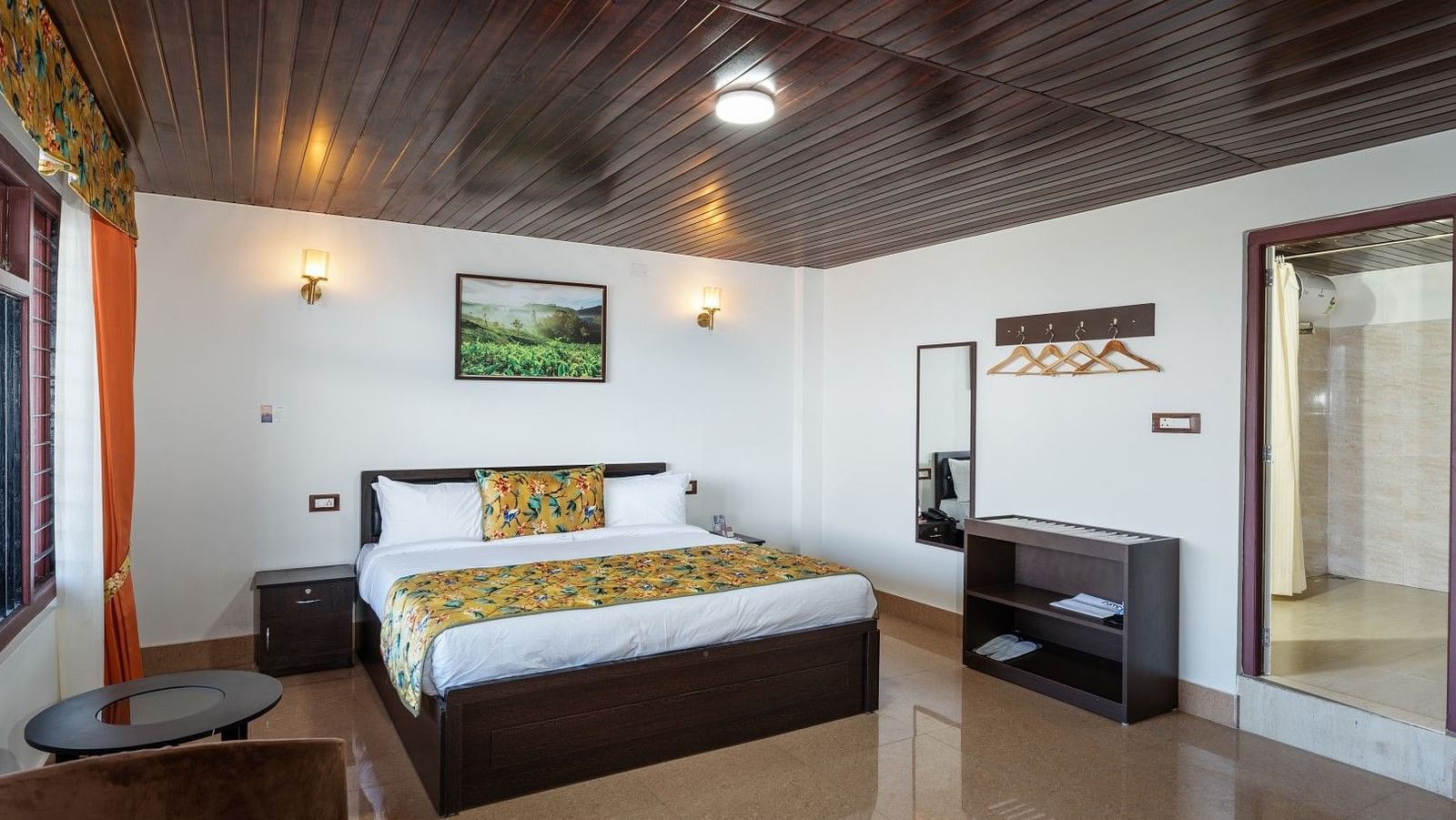 Image of a room with bed and wooden celing and flooring at Summit Sherpa Mountain Hotel & Spa, Kalimpong