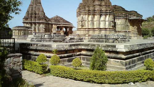 a temple complex with brown coloured exterior of temples