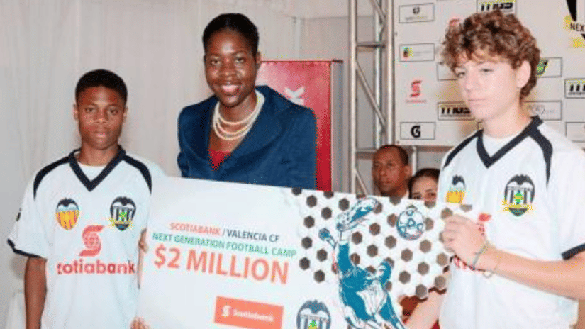 Foundation representatives presenting a financial donation to young athletes or students, demonstrating the organisation’s efforts toward empowering youth and nurturing talent through community partnerships.