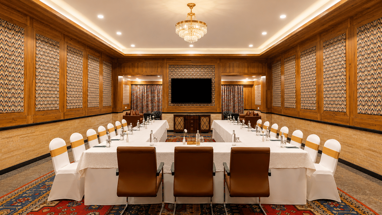 Elegant conference boardroom with chandelier at Mayfair Oasis Resort, Jharsuguda