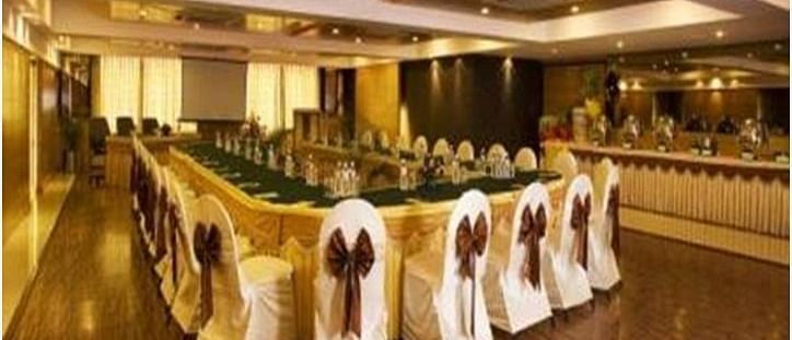 Rectangle seating arrangements inside the Senate Hall - Hotel Pai Vista, Mysore