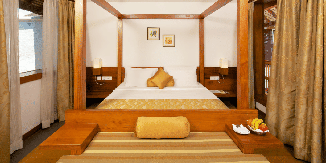 Lake Facing Room with a wooden four-poster bed